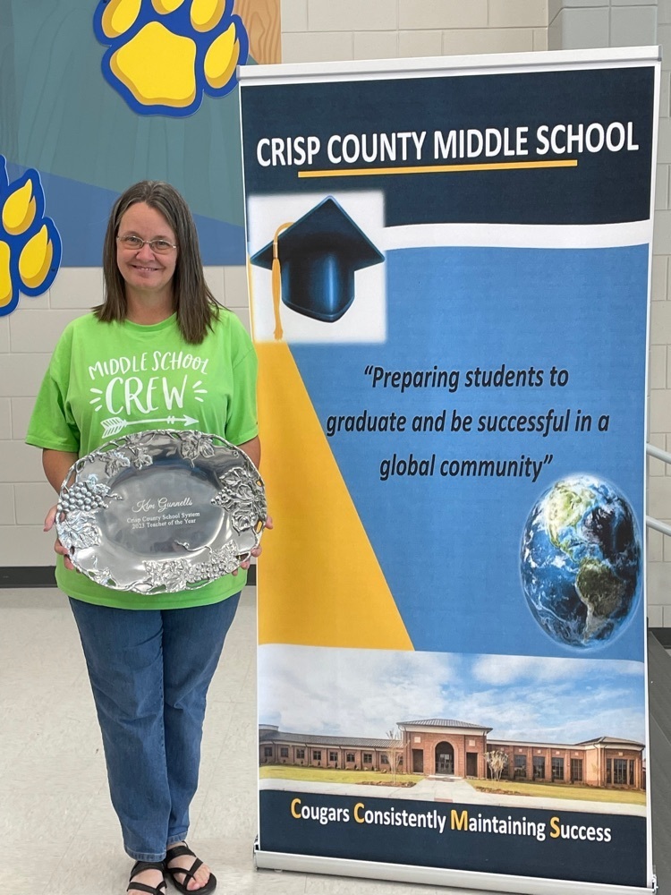 Kim Gunnells with her silver tray as CCSS Teacher of the Year.